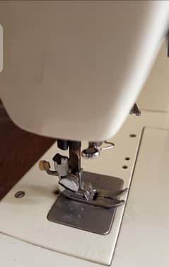 Sewing machine available with multiple functions