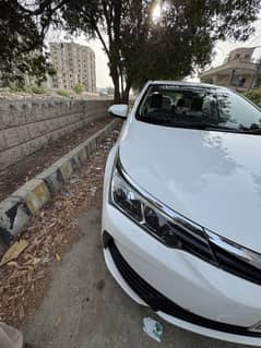 Corolla Altis 1.6 super white
