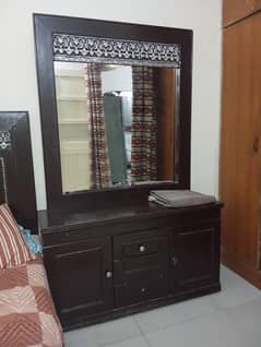 bed and dressing table