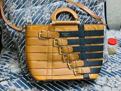 Hand bag.