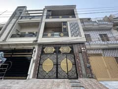 6 MARLA BRAND NEW TRIPLE STORY HOUSE Available FOR SALE FACING PARK
