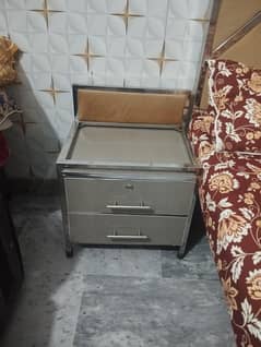 steel bed with side tables