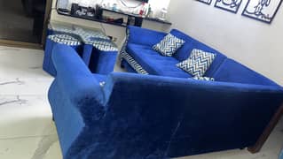 Blue L shaped sofa