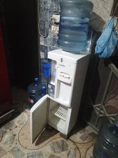 Used Enviro water dispenser with mini fridge
