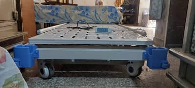 electronic patient bed with remote control and built in battery backup