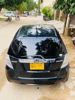 HONDA FIT HYBRID 2012 REG 2015
