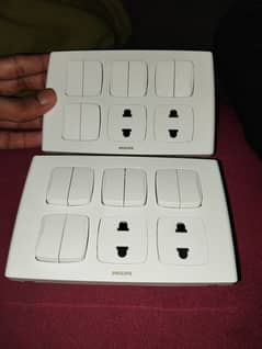 2 Brand New Philips 8 switch Plate With 2 sockets urgent sale