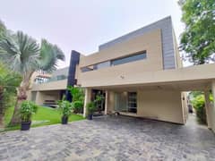 2 kanal modern bungalow with straight line front elevation available for rent in DHA phase 05