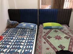2 single bed, 4 door cupboard detachable, 1 side table
