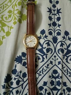100percent original alba by Seiko watch day/date real gold edition