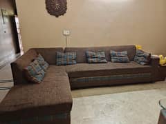 Brown L shape sofa for Urgent sale.