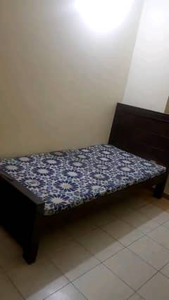 Single Wooden bed