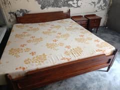 double bed and 2 side tables