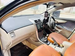 Corolla 2009 XLI Convert into GLI 0301-2428695