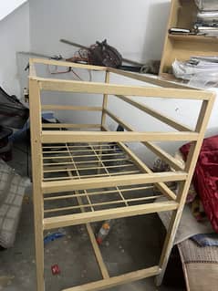 A stainless baby bed