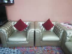 A 5seater sofa set golden regzin poshish like brand new