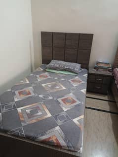 elegant single bed with side table