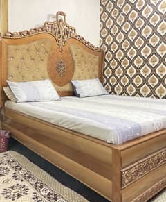 Slightly used bed ,side table and dressing