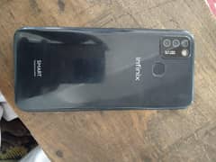 Infinix smart 6 mobile with box and charger.