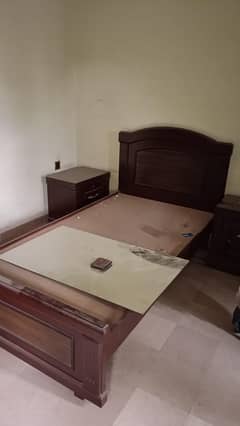 single bed and 2 side tables