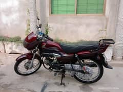 Honda Pridor (100cc) in brown colour