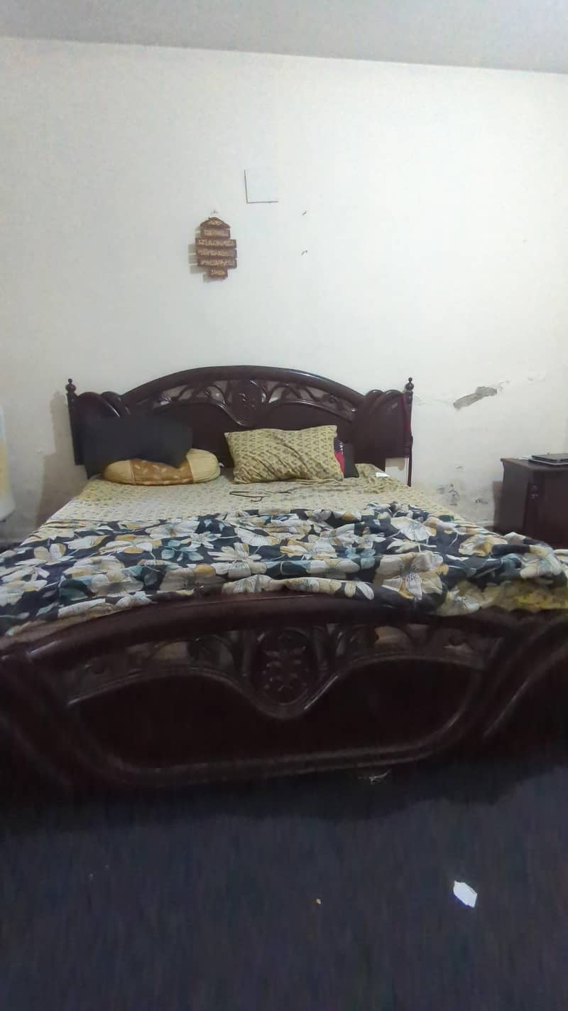only double bed with two side table in brown color 1