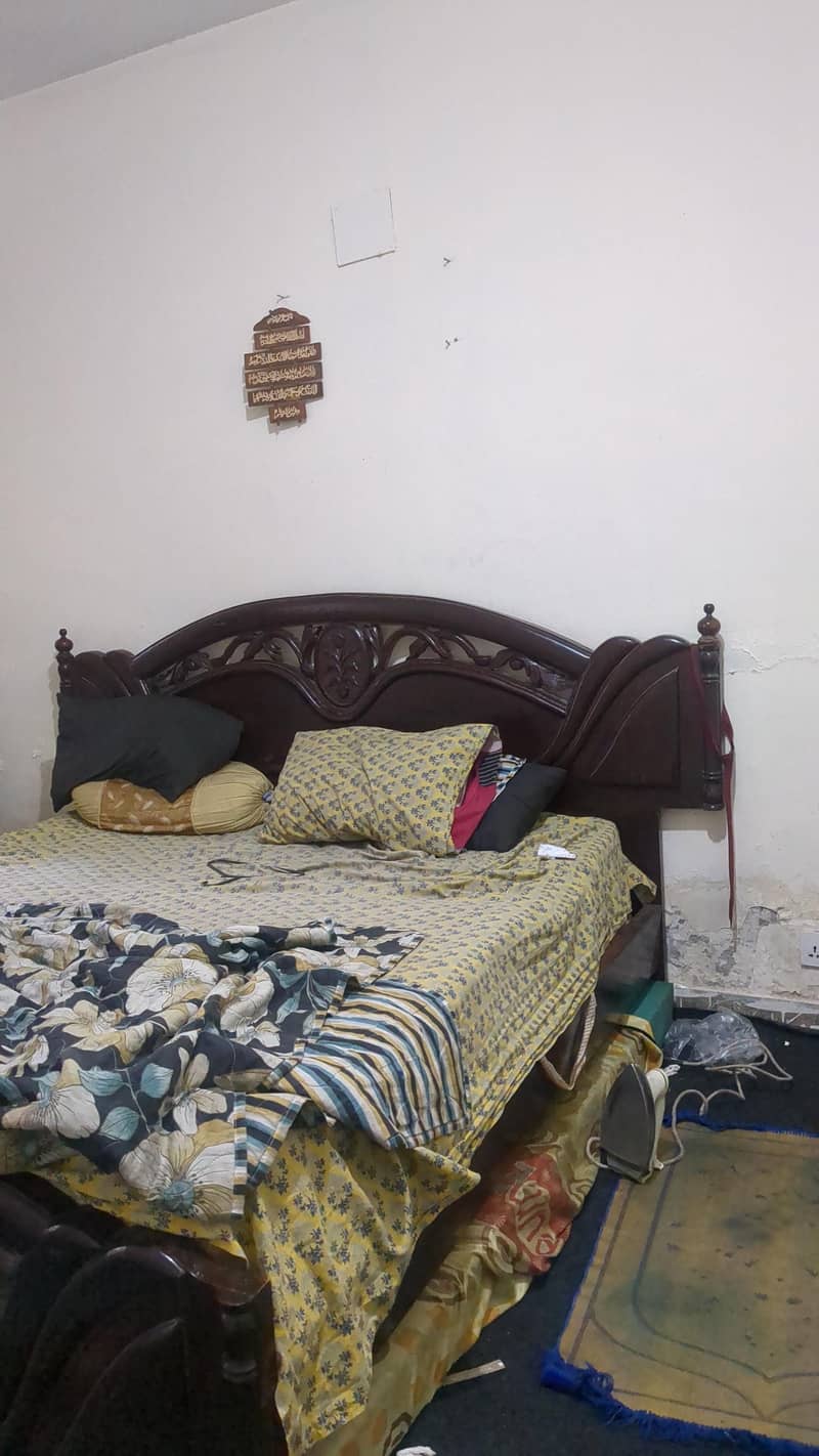 only double bed with two side table in brown color 2