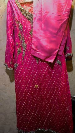2 piece suit of hand work . 1 time used