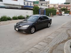 Honda civic VTI promostic oriel UG