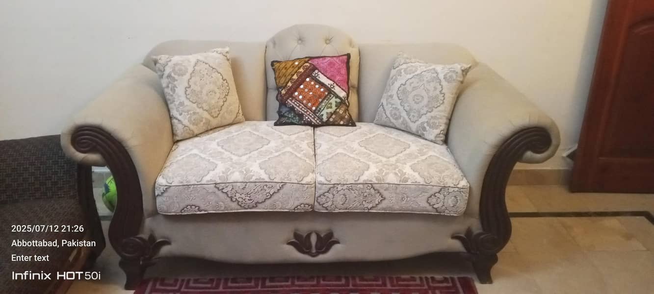 set of  sofa with center table 7 people can sit Easley and sofa c 1