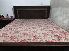 bed with side table
