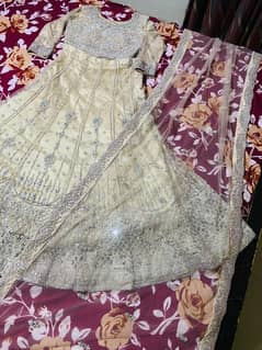 Heavy bridal/ party wear  cream / golden leh ga choli with dupatta