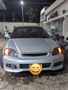 I am selling My Honda Civic 1999 Automatic  Modified