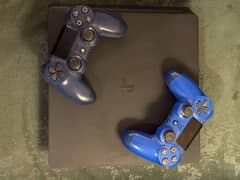 PlayStation 4 Slim 1TB + 2 Controllers + FIFA 19 Disc