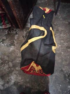 gn full kot with a bat with bag