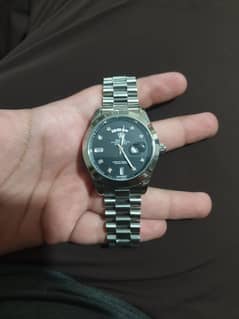 Rolex watch in new  condition