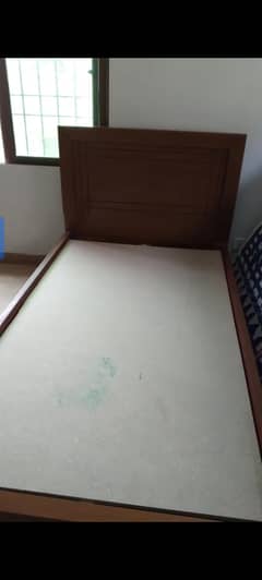 wooden single bed