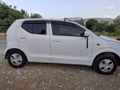 Suzuki alto trump ene charge 2017