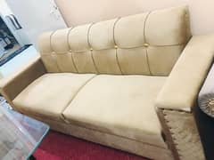 Slightly used brown sofa set and center table