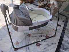 electric swimg and bamboo baby cot