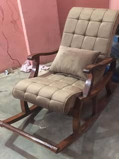 new rocking chair with extra cover .