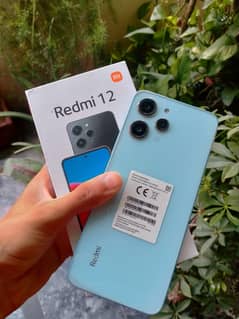 REDMI 12 (With box and charger)