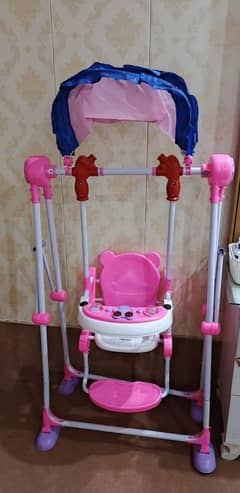 Deluxe baby swing chair with canopy and music trat pink_ and blue.
                                title=