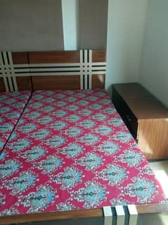 2 single beds and 2 side tables for sale
