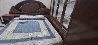 1 bed and 2 side table