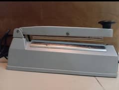 Plastic packing machine