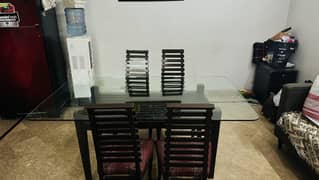 GLASS DINNING TABLE (72*42 INCHES)