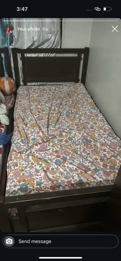 2 wooden single beds used