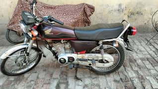 honda 125 2017 model new front tyre,new chain set, laminated