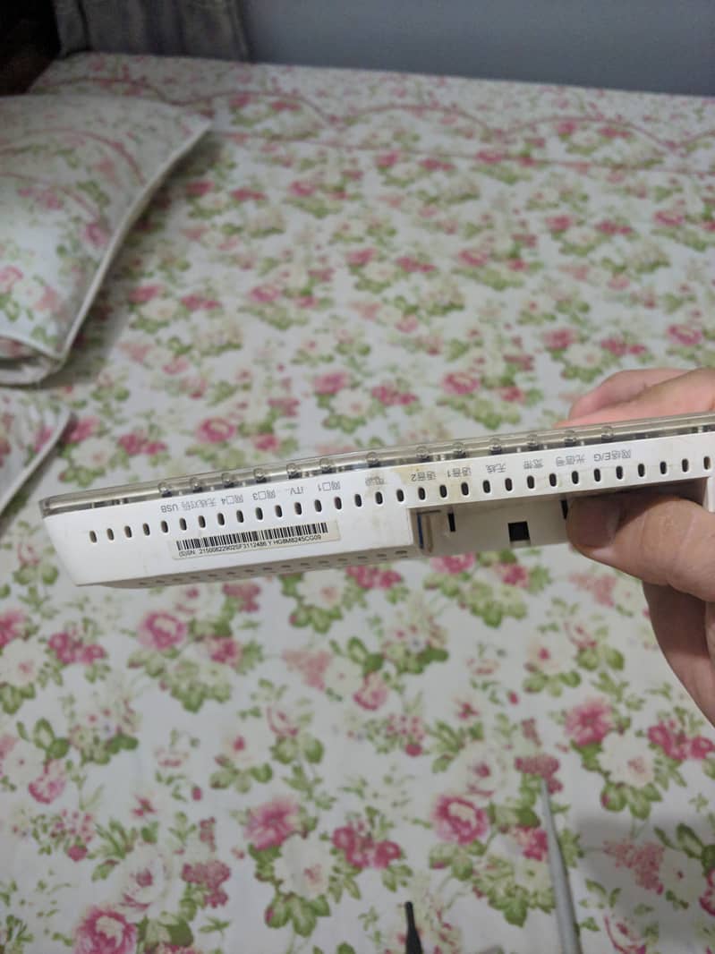 Huawei optical fiber Router and TP Link simple Wifi Router available 1